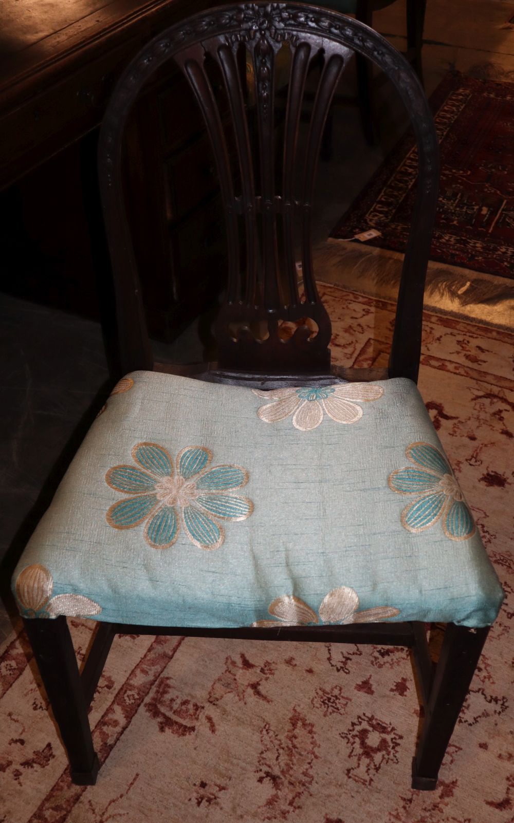 A set of ten Hepplewhite style mahogany dining chairs, (one in need of restoration)